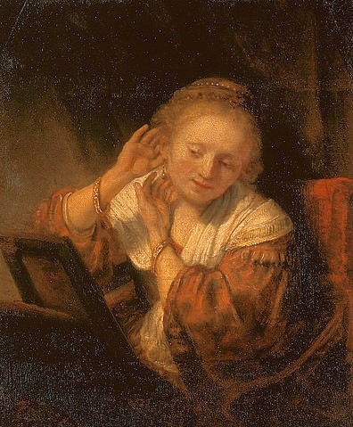 Rembrandt van Rijn, Junge Frau beim Anprobieren von Ohrringen. 1657 (Rembrandt van Rijn,St. Petersburg,Eremitage,1606-1669,Rembrandt van Rijn,17. Jahrhundert,Barock,Holland,holländisch,Niederlande,niederländisch,holländischer Barock,Genre,Genremalerei,Innenraum,Zimmer,Alltag,Porträt,Saskia,Frau,Frau, junge,anprobieren,Ohrr)