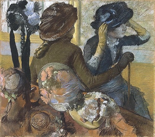 Edgar Degas, Beim Hutmacher. 1882 (Impressionismus,französischer,19. Jahrhundert,Pastell auf Papier,Madrid,Thyssen-Bornemisza,1834-1917,Degas,Edgar,Edgar Degas,Hut,Hüte,Hutmode,Mode,modisch,Frau,Frauen,Laden,Pariser Leben,boutique,städtisch urban,Anprobe,anprobieren,Hutprobe,Auswahl,Ware)