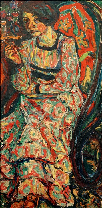 Ernst Ludwig Kirchner, Frau im Schaukelstuhl (Emmi Frisch) (Damenmode,Deutsche Kunst,Frau,Kunst,Mensch,Mode,Ornamentik,Ehefrau Von Berühmten,Portrait,Expressionismus,Künstlerfrau,Schaukelstuhl,Die Brücke,Kleid,Sitzen,Ganzfigurig,Gemustert)