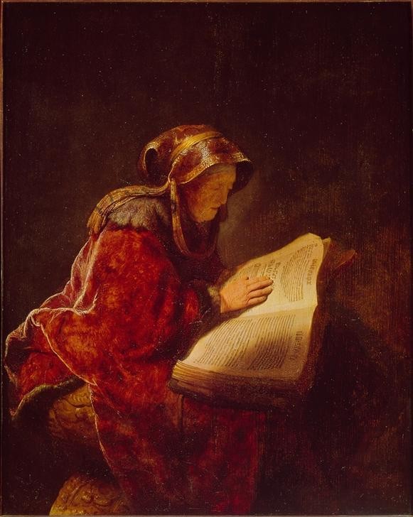Rembrandt Harmenszoon van Rijn, Die Prophetin Hanna oder die Mutter des Künstlers (Buch,Christentum,Damenmode,Frau,Kopfbedeckung,Mode,Religion,Alter,Barock,Neues Testament,Bibel,Hand,Mutter Von Berühmten,Lesen (Allgemein),Mutter,Niederländische Kunst,Prophetin,Leserin,Sitzen,Alte Frau,Kniestück,Konzentration,Gewand,Buch (Aufgeschlagen))