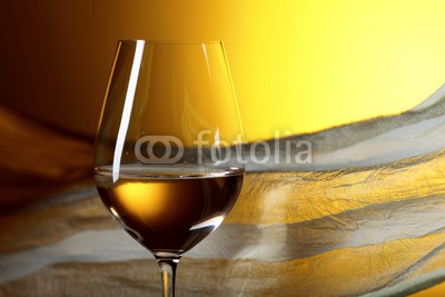 Igor Normann, Glass of white wine on a yellow background. (wein, weißwein, alkohol, glas, weiß, gelb, trinken, getränke, flüssigkeit, weingläser, hintergrund, luxus, gardine, bewegung, textil, wind, stoff, feier, feiern, weingut, bar, foodie, restaurant, kelch, party, alkoholiker, kristalle, romantisc)