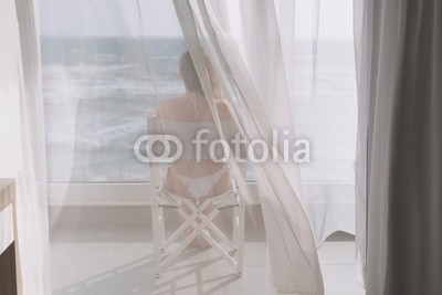 flowertiare, Naked beautiful female in the lace bikini sitting on the chair behind the transparent curtain on the glass balcony against the backdrop of the sea (nackt, frau, gardine, bikini, höschen, balkon, arsch, badeanzug, stuhl, spitze, unterwäsche, beine, jung, meer, resort, damenunterwäsche, sommer, verführerisch, figuren, abspecken, elegant, fitness, fenster, morgens, hotel, zimmer, schöner, nack)