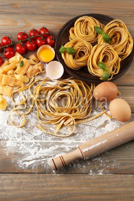 Africa Studio, Still life with raw homemade pasta and ingredients for pasta (life, roh, selbstgemacht, pasta, zutaten, backgrounds, kohlenhydrate, kirsche, kochen, kochen, kochkunst, kulinarisch, kultur, diät, getrocknete, trocken, ei, mehl, essen, frisch, gesundheit, gesund, zuhause, zutaten, italienisch, italien, küche, lunc)