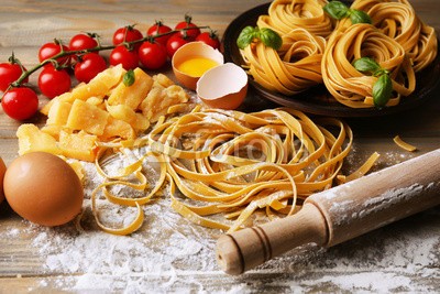 Africa Studio, Still life with raw homemade pasta and ingredients for pasta (life, roh, selbstgemacht, pasta, zutaten, backgrounds, kohlenhydrate, kirsche, kochen, kochen, kochkunst, kulinarisch, kultur, diät, getrocknete, trocken, ei, mehl, essen, frisch, gesundheit, gesund, zuhause, zutaten, italienisch, italien, küche, lunc)