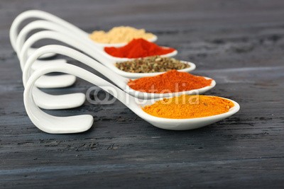 Africa Studio, Different kinds of spices in spoons on wooden background (arten, gewürz, löffeln, hölzern, backgrounds, aroma, aromatisch, divers, sortiment, hell, tragen, chilies, sammlung, verfärbt, bunt, würze, kochen, exemplar, kochkunst, kulinarisch, different, trocken, flavour, essen, foodie, grau, gruppe, haufe)