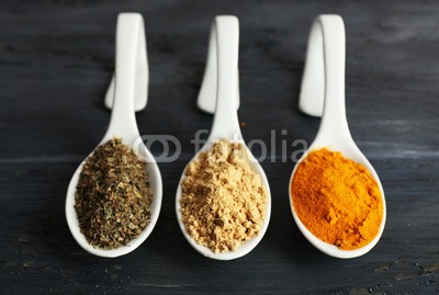 Africa Studio, Different kinds of spices in spoons on wooden background (arten, gewürz, löffeln, hölzern, backgrounds, aroma, aromatisch, divers, sortiment, hell, tragen, chilies, sammlung, verfärbt, bunt, würze, kochen, kochkunst, kulinarisch, different, trocken, flavour, essen, foodie, grau, gruppe, haufen, krau)