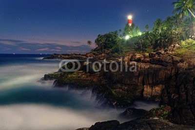 Viktar, Colorful sunset at the Kovalam beach, Kerala, India. Lighthouse view. Long exposure. (indien, baum, küste, tropisch, grün, reisen, bunt, erstaunlich, anblick, fels, rot, sand, linie, urlaub, sommer, kerala, paradise, asien, welle, touristen, strand, indianer, arabisch, kokos, blau, sonnenuntergang, tropics, seelandschaft, himme)