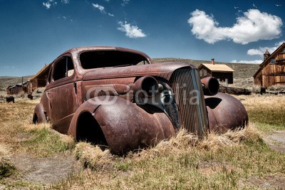 Frank Waßerführer, rostiges Autowrack (autos, wrack, oldie, karosserie, rost, schrott, autos, leerstehend, ghost town, dorf, landschaft, allein, holzhaus, haus, prärie, uns, amerika, nordamerika, handwer)