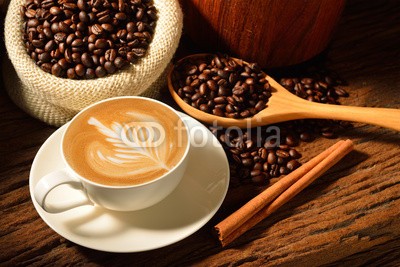 amenic181, A cup of cafe latte and coffee beans (kaffee, kaffee, latte, cappuccino, cappuccino, kunst, expressotasse, bohne, koffein, schokolade, macchiato, tassen, sackleinen, braun, getrÃ¤nke, aroma, trinken, frÃ¼hstÃ¼cken, schaum, profilstahl, mug, holz, auf, morgens, close-up, sahne, jahrgan)