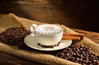 amenic181, A cup of cappuccino and coffee beans on old wooden background (kaffee, kaffee, cappuccino, cappuccino, latte, macchiato, koffein, tassen, schokolade, expressotasse, bohne, aroma, bohne, braun, trinken, sackleinen, frÃ¼hstÃ¼cken, zimt, getrÃ¤nke, schaum, mug, holz, auf, morgens, close-up, sahne, jahrgang, schwar)