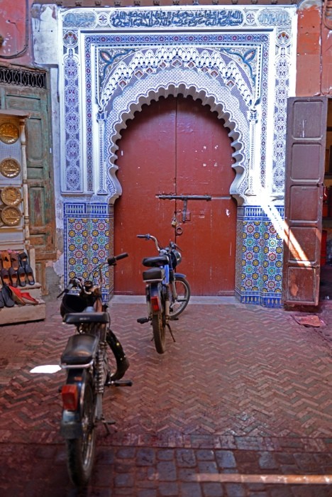 Hady Khandani, TWO BIKES IN FRONT OF A DOOR - MARRAKECH - MOROCCO