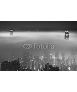 leeyiutung, Misty night view of Victoria harbor in Hong Kong city