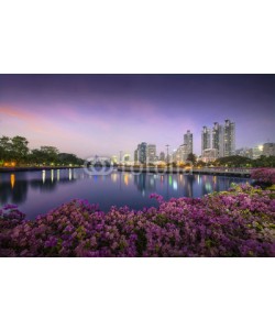 Sakrapee Nopparat, High business building behind the river in the park at beautiful night Bangkok Thailand.