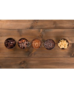 Africa Studio, Bowls with cocoa products on wooden background