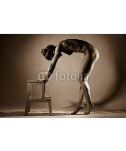 Anton Belovodchenko, Naked woman body on black background. Fine art photo of woman body.