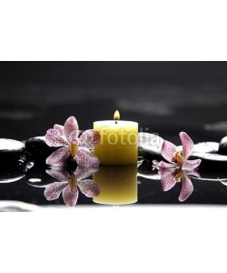 Mee Ting, burning candle and zen stones with pink orchid
