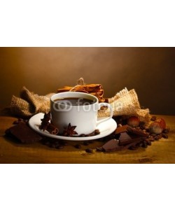 Africa Studio, coffee cup and beans, cinnamon sticks, nuts and chocolate
