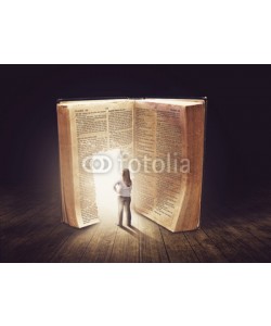 kevron2001, Woman looking at large book