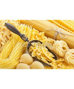 andriigorulko, retro still life with assortment of uncooked pasta
