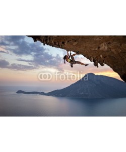 Andrey Bandurenko, Young female rock climber at sunset, Kalymnos Island, Greece