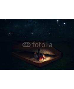 kevron2001, Woman reading inside huge Bible