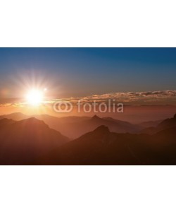 a2l, sunset mood on top of tirol mountain with peaks clouds and sun