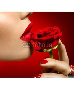 Subbotina Anna, Beautiful model woman kissing red rose flower. Sexy red lips