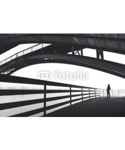 frankie's, Man standing under bridge arch