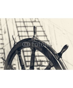 frog-travel, Steering wheel of old sailing vessel in retro style.