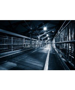 mandritoiu, Moody monochrome view of Williamsburg bridge pedestrian walkway by night in New York City