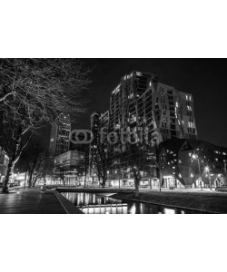 GooDAura, ROTTERDAM, NETHERLANDS - DECEMBER 26, 2015: Black-white photo of famous city sights at night time on December 26, 2015 in Rotterdam - Netherlands.