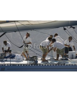 biker3, Side view of crew members working on sailboat