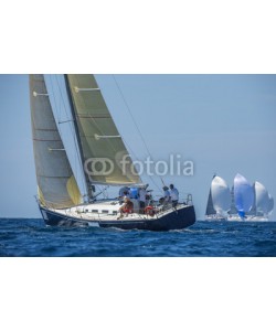 Pavel, Racing boat with carbon sails sailing up wind