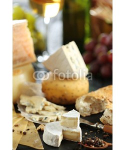 Africa Studio, Slate plate with variety of cheese on table