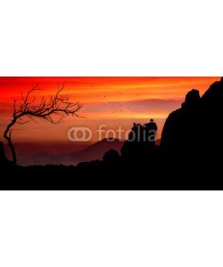 Cara-Foto, Dramatischer Sonnenuntergang über Felslandschaft