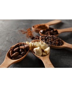 Africa Studio, Spoons with different cocoa products on grey background