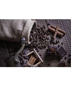 gpointstudio, Sack of coffee beans with chocolate and cinnamon .