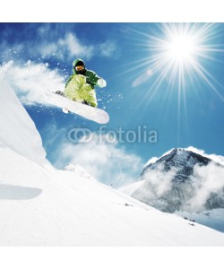 dell, Snowboarder at jump inhigh mountains