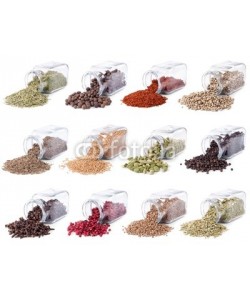 andriigorulko, Spices and herbs are scattered on a white background