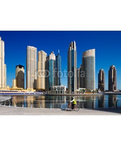 Sophie James, A cyclist cycles the Marina walk, Dubai Marina and JBR