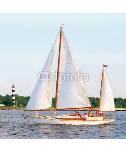 Aleksey Stemmer, white sail yacht sailing. Riga, Latvia