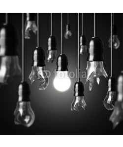 chones, idea concept with broken bulbs and one glowing bulb
