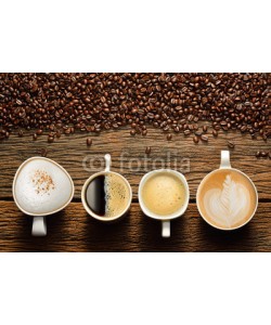 amenic181, Variety of cups of coffee and coffee beans on old wooden table