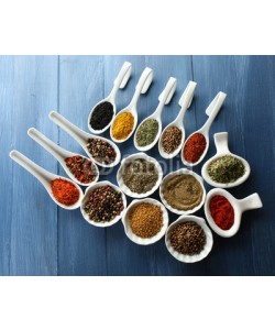 Africa Studio, Different kinds of spices in ceramics spoons, close-up,