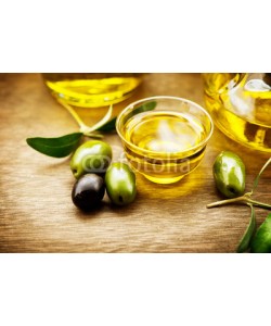 Subbotina Anna, Olives and olive oil. Bowl of extra virgin olive oil