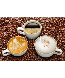 amenic181, Variety of cups of coffee on coffee beans background