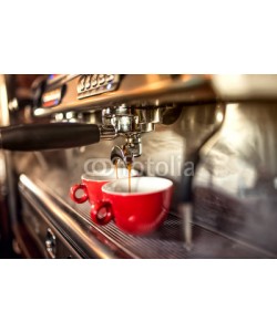 Hoda Bogdan, coffee machine preparing fresh coffee and pouring into red cups at restaurant, bar or pub.