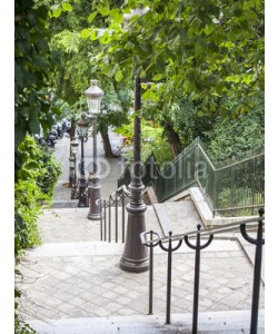Elena Belyaeva, PARIS, FRANCE, on AUGUST 31, 2015. The street with a ladder on a slope of Montmartre