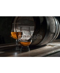 razoomanetu, Two glasses of strong alcohol, amid oak barrels