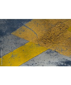Reflective yellow bands painted on a parking lot pavement, Azahara MarcosDeLeon 